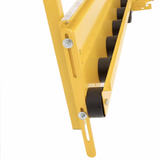 Yellow metal shelf with black rubber wheels on a white background