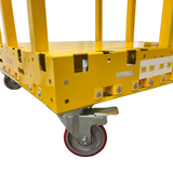 Yellow industrial cart with a close-up of a wheel on a white background