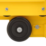 Close-up of a yellow machine with a black wheel on a white background